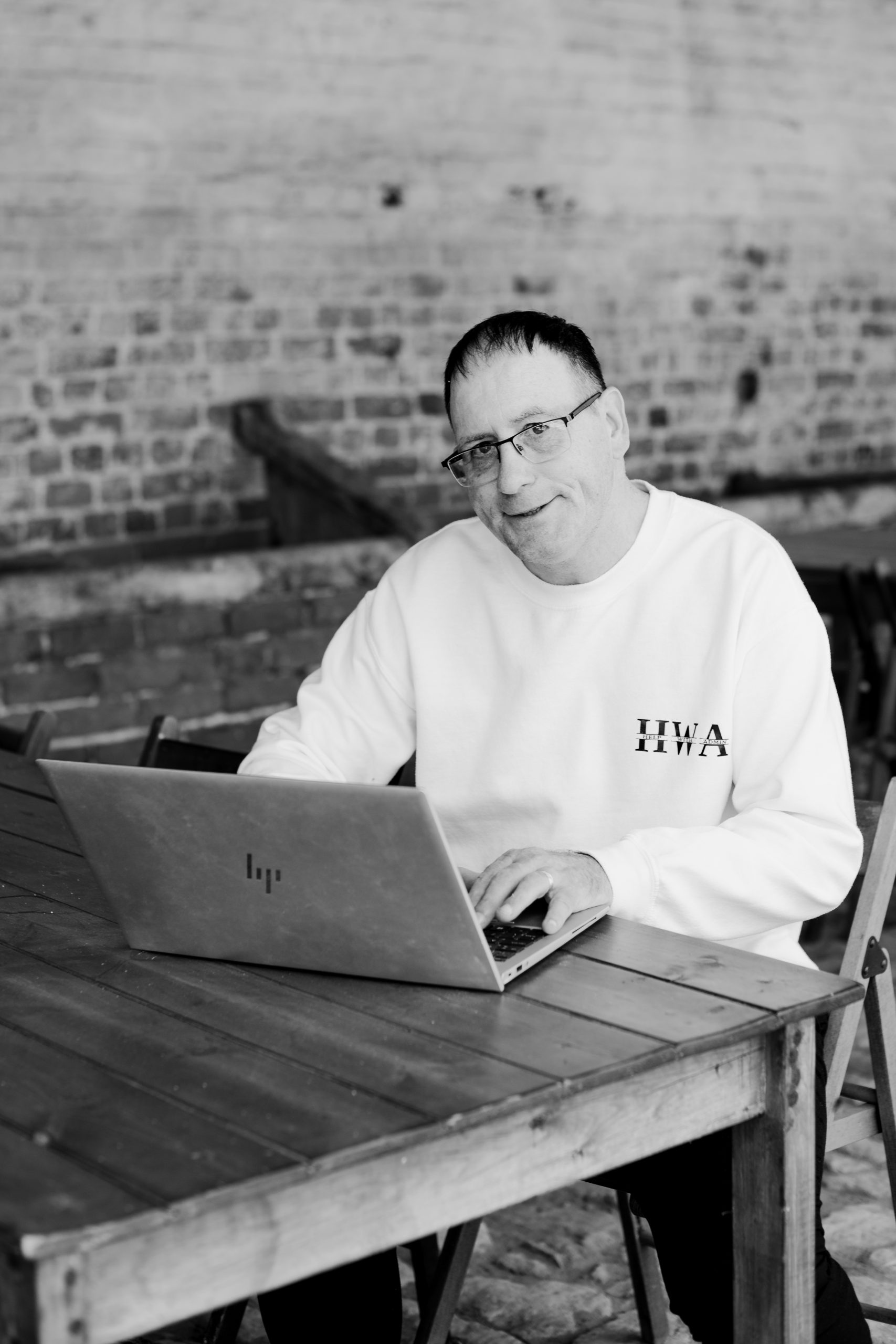 Steve Bisby B&W Head Shot with PC